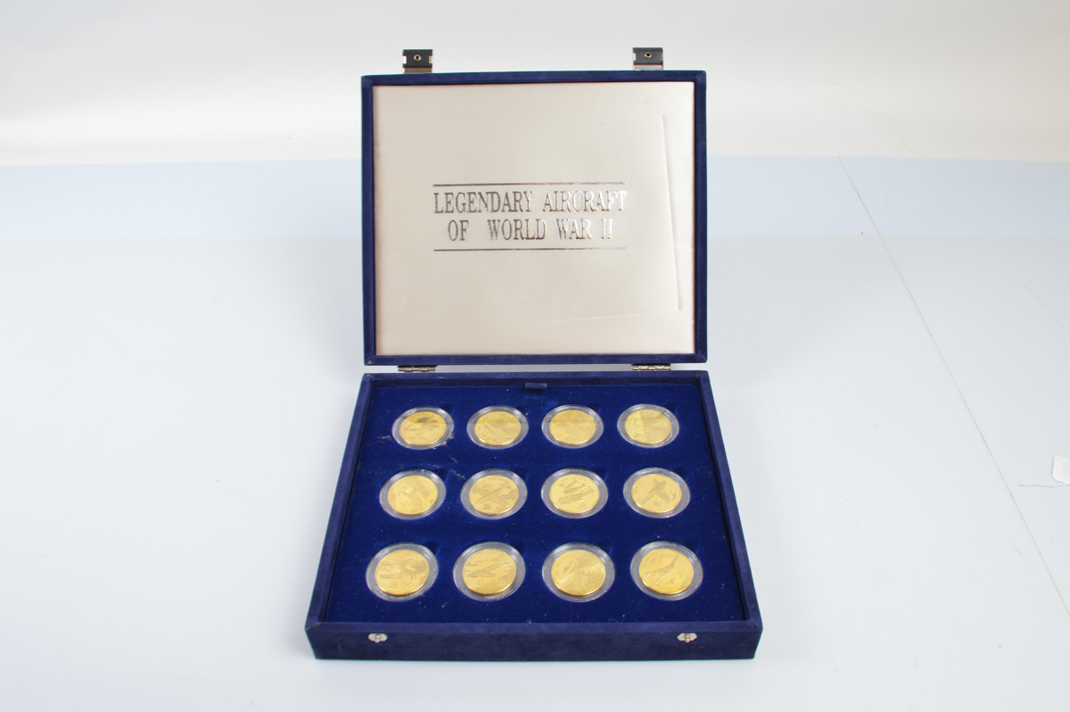 A presentation set of Legendary Aircraft of WWII coins, issued by the Republic of the Marshall