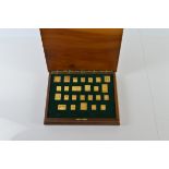 A cased set of commemorative silver gilt British South African stamps, from the Victorian, Edwardian