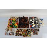 A good quantity of mostly loose Lego, including bricks, figures, keyrings, etc.