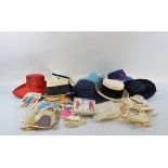 A quantity of lady's dress hats, 70s sun hats in navy blue and turquoise, and a quantity of dress