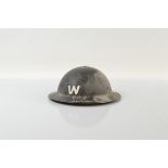 A WWII black painted Wardens helmet, with head piece and chin strap, 30cm x 29cm