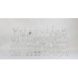 A large collection of assorted glassware, to include four cut glass decanters with stoppers, largest
