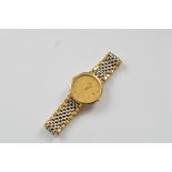 A gentleman's Omega bi metal quartz wristwatch, from The Significant Moments Range, gold dial, baton