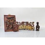 A collection of carved Chinese ornaments, including a carved gilt court scene, 33cm x 23cm, a