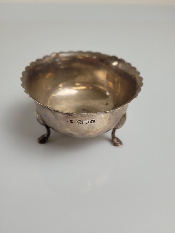 An Edward VII silver bowl, with inset 1787 silver coin having splayed shaped and cut rim, dated