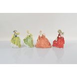 Three Royal Doulton figurines, Autumn Breezes HN1934, Buttercup HN2309 and Fair Lady HN2193 together