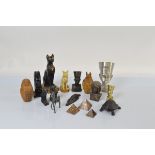 A collection of Egyptian style ornaments, including a pair of canopic jars and covers etc