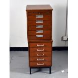 A two-piece specimen cabinet, with numerous drawers, with fitted tray to top, 40cm x 108cm x 50cm