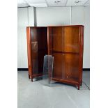 Two hardwood displays, with two sliding glass doors to the front, with six adjustable glass shelves,