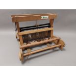 A Weavemaster table top loom