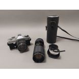 Praktica PLC2 Camera, together with lens and lens in case (2)