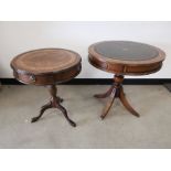 Two reproduction circular leather topped drum tables, both having two drawers to opposite sides.