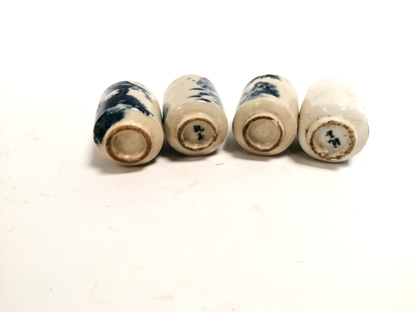 A group of four Chinese blue and white snuff bottles of identical form, two with the same female - Image 2 of 2