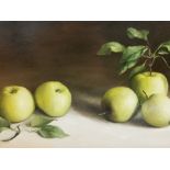 Susie Philipps, oil on board, fruit still life of green apples. Monogrammed lower right. 47cm x