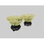 A pair of spinach jade style Chinese glass bowls, diameter 11cm, together with a similar tripod