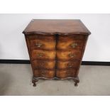 19th Century Walnut veneer serpentine set of drawers, four drawers with pull out shelf beneath the