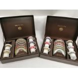 An Oakley fine china harlequin cased set of cups and saucers, over two boxes, lacking one cup,