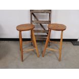 Pair of elm stools, together with a set of Spinney wooden step ladders. (3)