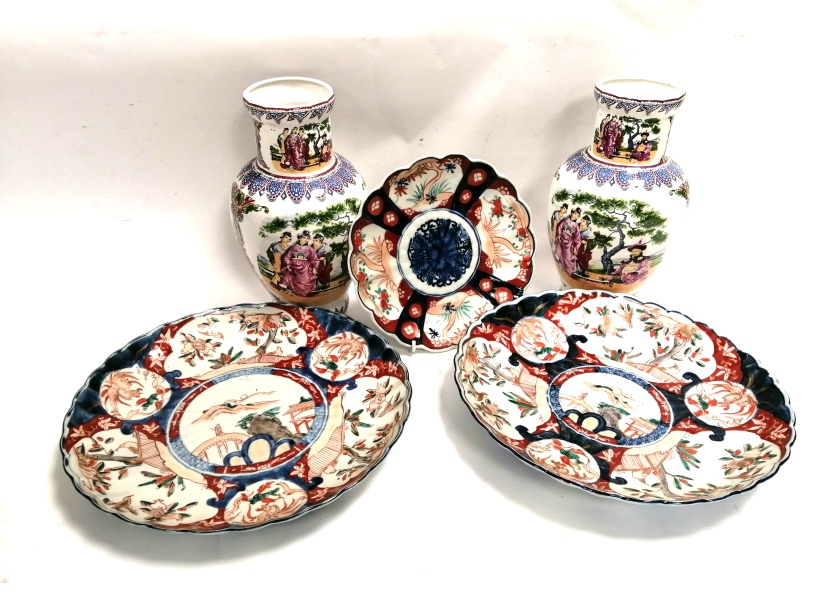 Two Japanese floriform Imari plates, together with another similar and a pair of kitsch Peoples