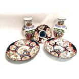Two Japanese floriform Imari plates, together with another similar and a pair of kitsch Peoples