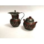 Two Chinese Yixing Stoneware vessels with overlaid metalwork, taking the form of dragons, the