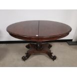 Mahogany oval extending table, raised on single pedestal. 114cm L x 90cm W x 73cm H
