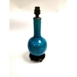 A Chinese turquoise glazed anhua bottle neck vase, with crackle to the glaze, converted to a lamp,