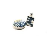 A Chinese blue and white porcelain snuff bottle with a continuous waterside landscape, height 6.5cm,