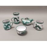 A Tintagel pottery teaset for two, having oriental pattern, consisting of tea pot, two cups, jug and