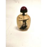 A Chinese reverse glass snuff bottle, with internal Emperor and calligraphic inscription, height