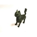 An Islamic censer in the form of a lion dog, height 18cm