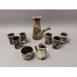 Woburn Studio pottery coffee set, consisting of six cups, coffee pot, sugar bowl, and milk jug.