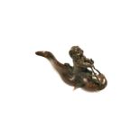 A Japanese style metalwork fish, being ridden by a rodent, height 6.5cm
