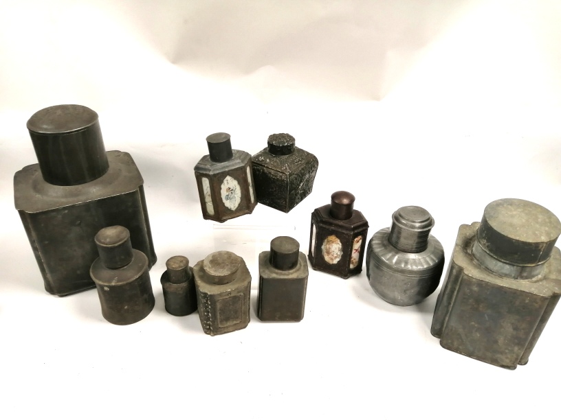 Ten Asian metalwork tea caddies or canisters, to include a repousse example with raised pavilion