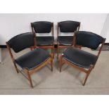 Set of four mid 20th Century G-Plan teak dining chairs, finished in black vinyl.