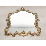 Scroll form gilt framed mirror