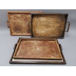 Four antique wooden trays