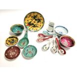 A group of polychromed 20th Century Chinese tableware to include rice bowls and spoons, the