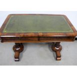 A William IV rosewood writing table, the top having a moulded edge with a green leather tooled