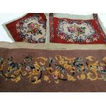 A small group of woolwork samples, to include two square samples with ornamental garden scenes, 77cm