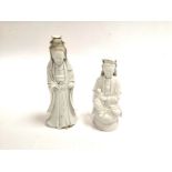 A Chinese Dehua porcelain blanc de chine figure of Guanyin, with hole to verso for votive