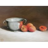 Susie Philipps, oil on board, still life of silver vessel and peach fruit. Monogrammed lower left.