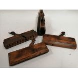Four early 20th Century wood working plane tools, with impressed initials and names, including 'E.
