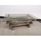 Mid 20th Century tubular chrome coffee table, stacked cylindrical steel form, smoked glass top. 99cm