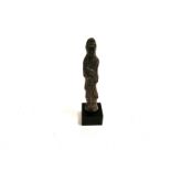 An archaic style female statuette, height 11.5cm, possibly Chinese