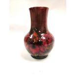 A Moorcroft pottery flambé glazed vase with tubelined orchid pattern, the base with Moorcroft