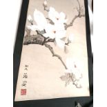 An Chinese ink on paper scroll with a naturalistic design of branches of white flowers, with