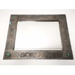 Art nouveau style metal framed mirror, bevel edge to the glass, soft metal possibly pewter wrapped