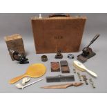 A selection of mixed collectables, including copper plates, student microscope, vanity items (