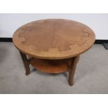 20th Century circular coffee table, having central gear design. 86cm diameter x 51cm H